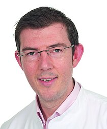 Porträt Dr. Pierre Göbel