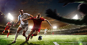 Fußballspiel am Abend im Stadion